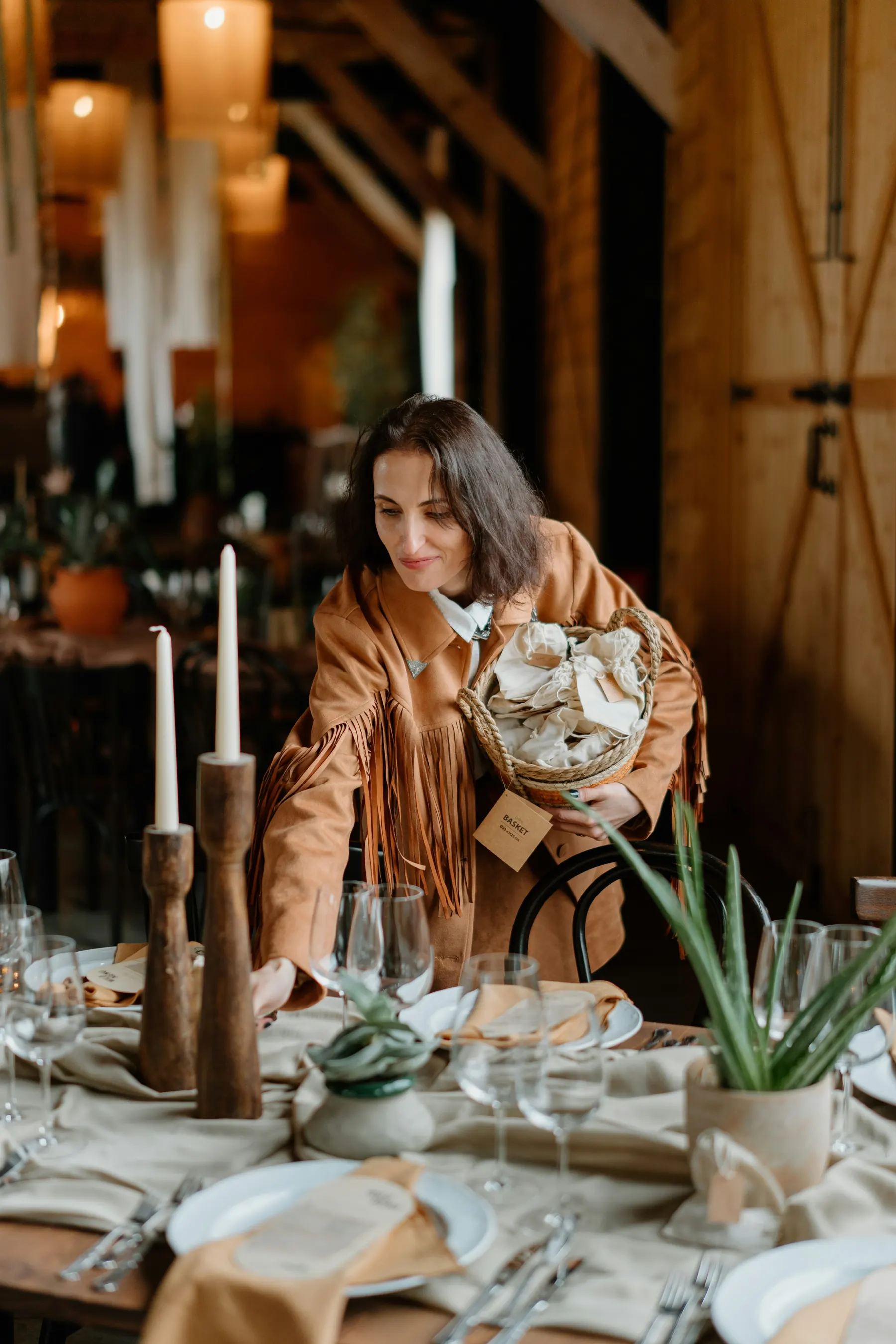 Event planning table with notes, flowers and working materials